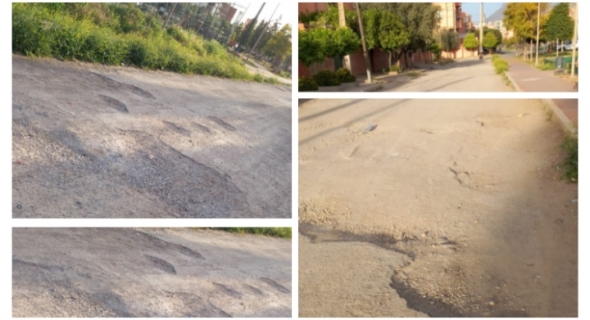 الحفاري شادين الصف!… صحاب الطوموبيلات والساكنة ديال الأطلس تايطالبو جماعة بني ملال بإصلاح طريق مهترئة و مملوءة بالحفر العميقة