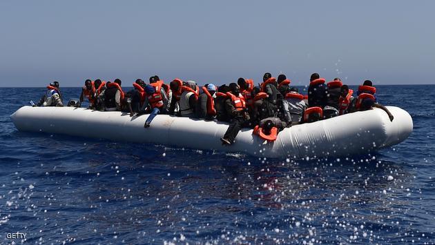 Migrants and refugees wait for help during a rescue operation at sea of the Aquarius, a former North Atlantic fisheries protection ship now used by humanitarians SOS Mediterranee and Medecins Sans Frontieres (Doctors without Borders), on May 24, 2016 in the Mediterranean sea in front of the Libyan coast. / AFP / GABRIEL BOUYS (Photo credit should read GABRIEL BOUYS/AFP/Getty Images)