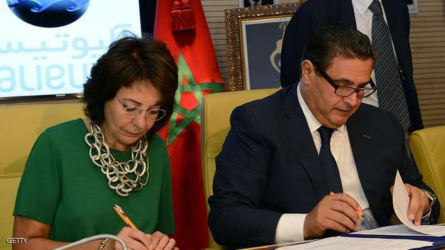 Maria Damanaki (L), the European Commissioner for Maritime Affairs and Fisheries and Aziz Akhannouch (R) minister of Agriculture and fisheries sign documents as part of bilateral fisheries partnership agreements in the Moroccan city of Rabat on July 24, 2013. AFP PHOTO / FADEL SENNA (Photo credit should read FADEL SENNA/AFP/Getty Images)