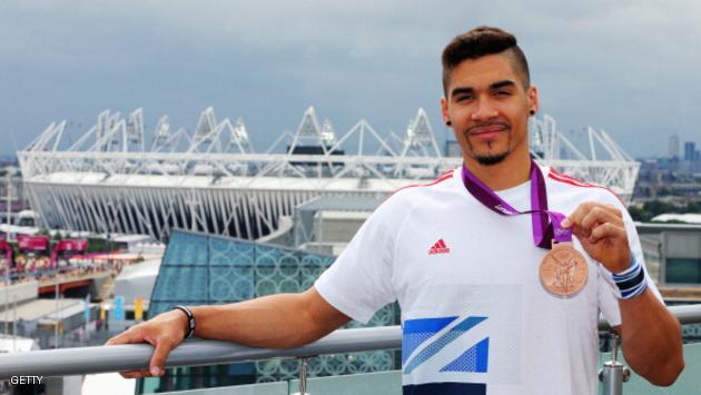 LONDON, ENGLAND - JULY 31: (FREE FOR EDITORIAL USE) Louis Smith of Team GB with his bronze medal at the adidas Olympic Media Lounge at Westfield Stratford City on July 31, 2012 in London, England. (Photo by Alex Grimm/Getty Images for adidas)