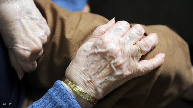 The hands of an elderly woman are pictured as she sits in her room on December 29, 2011at an old people's home near Montauban, south western France. AFP PHOTO / ERIC CABANIS (Photo credit should read ERIC CABANIS/AFP/Getty Images)