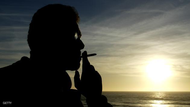 Monterey- JUNE 9: Darrell Ingham smoking a cigarette on Carmel Beach during the Bridgestone Grand Prix of Monterey round 5 of the CART (Championship Auto Racing Teams) FedEx Championship Series on June 9, 2002 at the Laguna Seca Raceway in Monterey, California, United States. (Photo by Darrell Ingham/Getty Images)