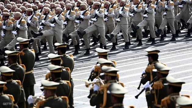 Iranian Army soldiers march during the Army Day parade in Tehran on April 18, 2015. Amid rising tension between Iran and Saudi Arabia, Iranian President Hassan Rouhani said that Iran's military is purely for defence and should not be seen as an aggressive threat in the Middle East. AFP PHOTO/BEHROUZ MEHRI (Photo credit should read BEHROUZ MEHRI/AFP/Getty Images)