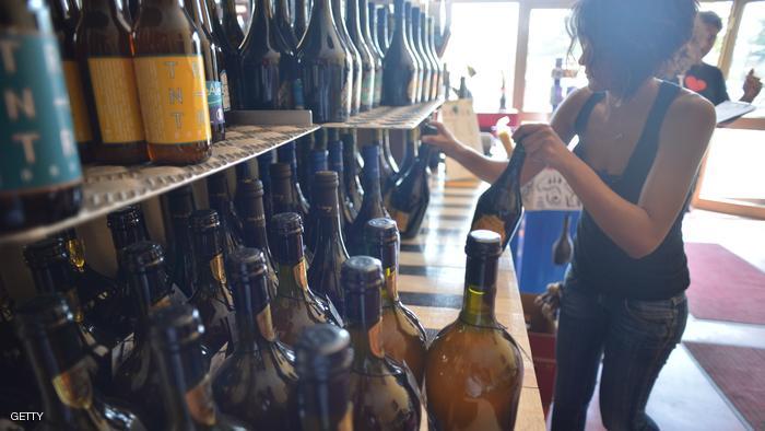 TO GO WITH AFP STORY BY Ljubomir Milasin
An assistant displays bottles of beer in the shopping area of the "Birra del Borgo" brewery on August 23, 2012 in the brewery in the tiny town of Borgorose, some 100 kilometres (62 miles) from Rome. Craft beers currently make up around two percent of Italy's beer market but the share is growing in double-figures every year as the trend catches on. AFP PHOTO / ANDREAS SOLARO (Photo credit should read ANDREAS SOLARO/AFP/GettyImages)