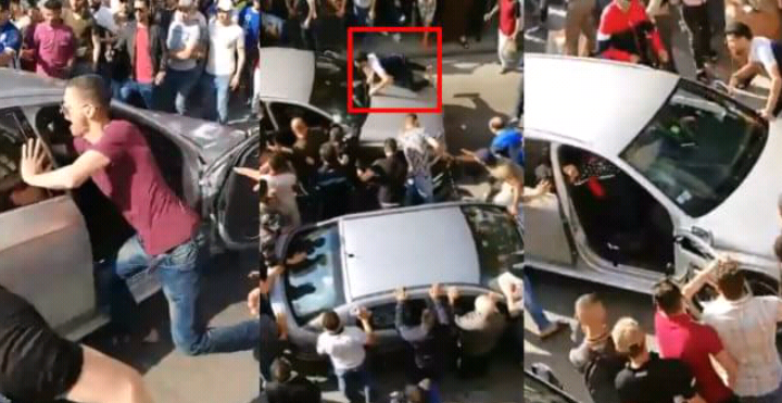 بالفيديو… مواطنون يهاجمون سيارة ويكسرونها في الشارع