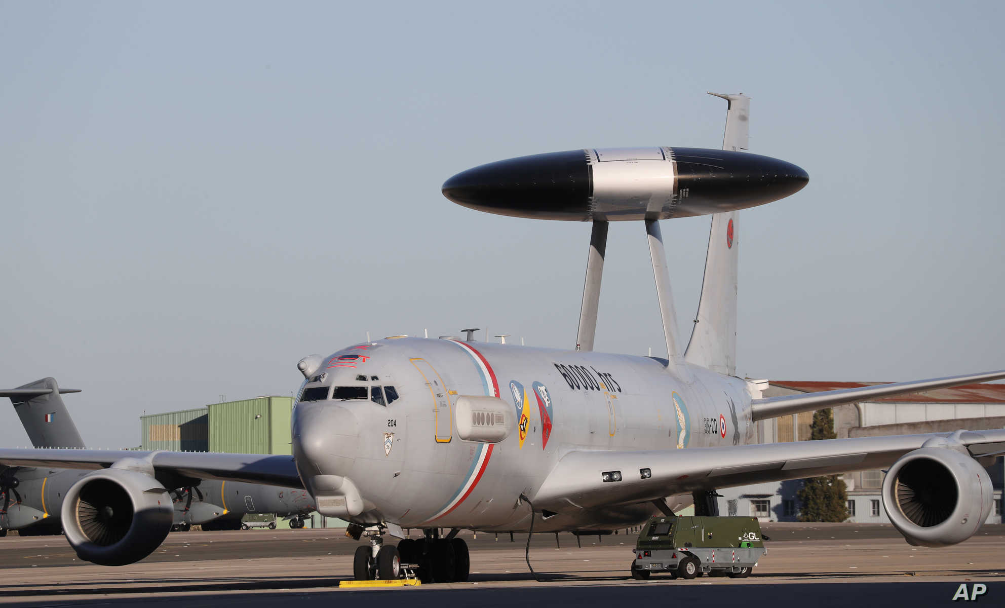 A French air force AWACS plane is parked on a tarmac at an army base in Orleans, central France, Thursday, Jan. 16, 2020. (Ludovic Marin/Pool Photo via AP)