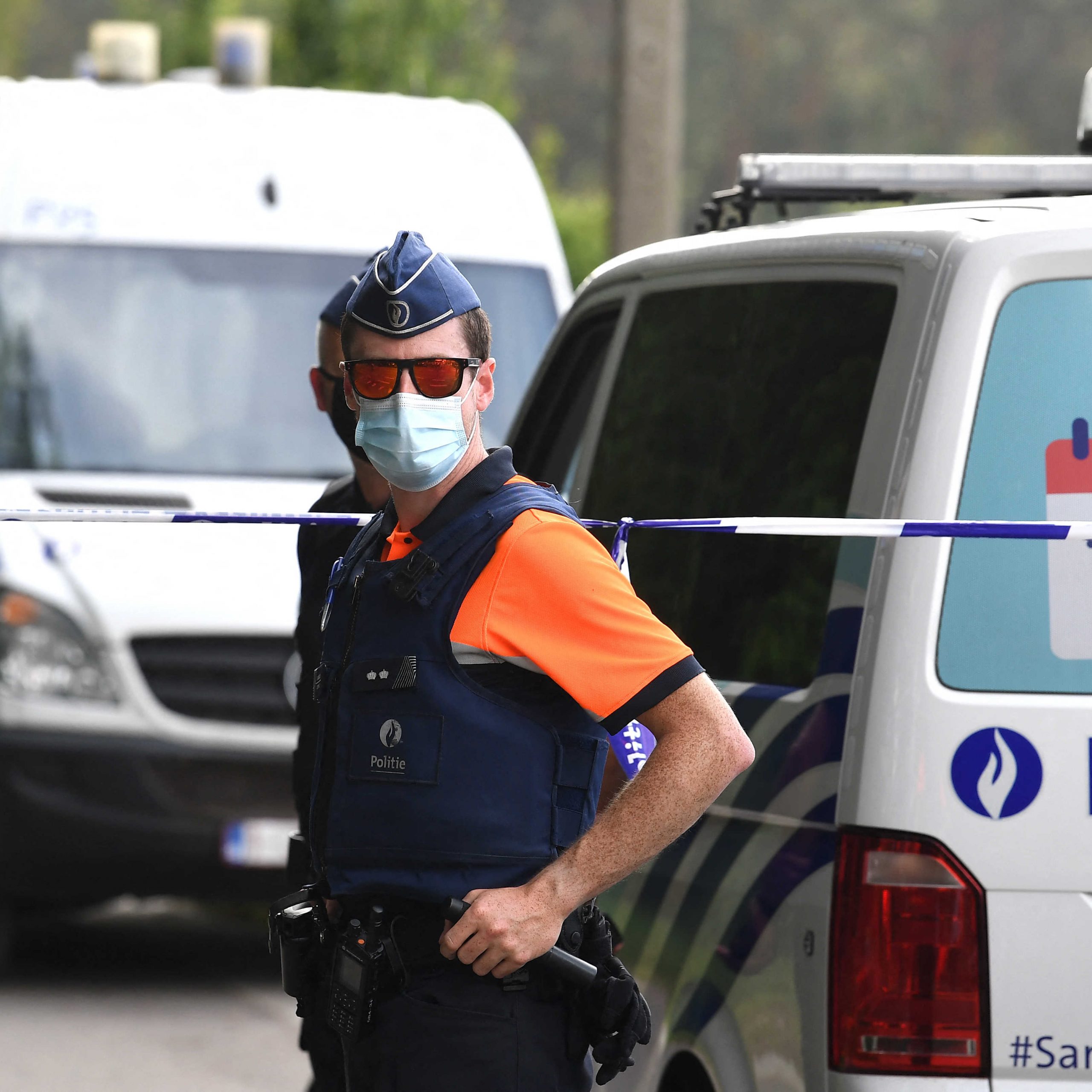 Belgium police cordon off the area after a body found in the Dilserbos, a forest area of Hoge Kempen National Park near Dilsen-Stokkem, was confirmed as that of missing rogue soldier Jurgen Conings, on June 20, 2021. - Jurgen Conings, the far-right Belgian soldier who sparked a manhunt last month when he went missing after stealing arms from a military base, "has been found dead", the country's defence minister and chief of staff said in a statement on June 20, 2021. Prosecutors had earlier said that a body found in eastern Belgium of a man who appeared to have killed himself with a gun was likely Conings "according to the first elements of the investigation". (Photo by JOHN THYS / AFP)