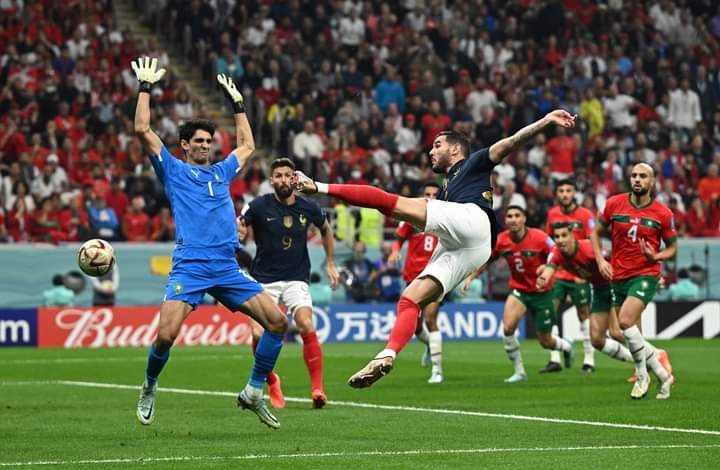 Soccer Football - FIFA World Cup Qatar 2022 - Semi Final - France v Morocco - Al Bayt Stadium, Al Khor, Qatar - December 14, 2022 France's Theo Hernandez scores their first goal REUTERS/Dylan Martinez