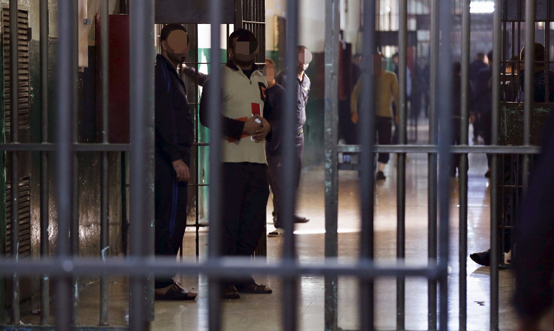 Prisoners seen at Swaqa Correction and Rehabilitation Center, near the city of Karak, November 30, 2015. Prison officials at Swaqa say that the center has one of the world's best success rates in decreasing repeat offenses. Only seven percent of prisoners, who undergo training and participate in qualification courses for two years at Swaqa, commit a second crime, according to the center's director Colonel Talal Al-Alabdallat. Picture taken November 30, 2015. REUTERS/Muhammad Hamed